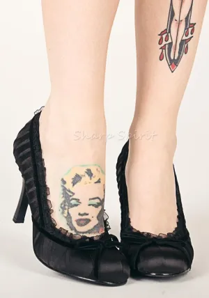 4 Heel Satin Pump With Velvet Bow.