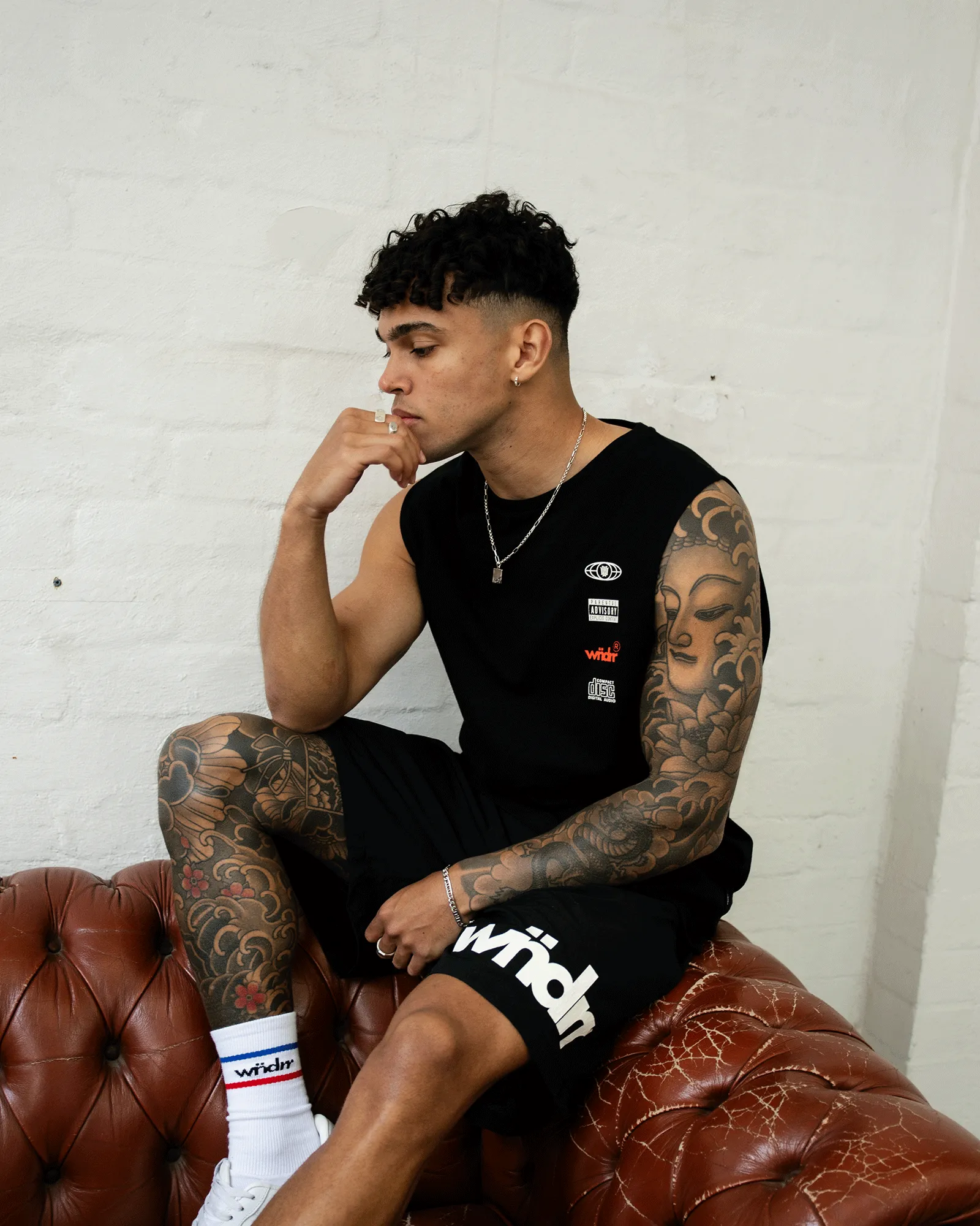 HIGH SIGN MUSCLE TOP - BLACK